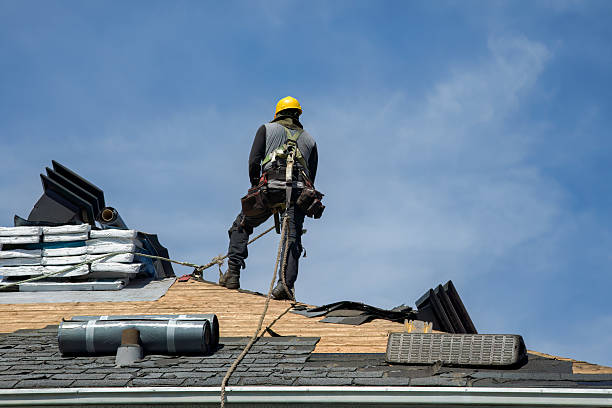Professional Storm Damage Roof Repair technician working in Drake, KY
